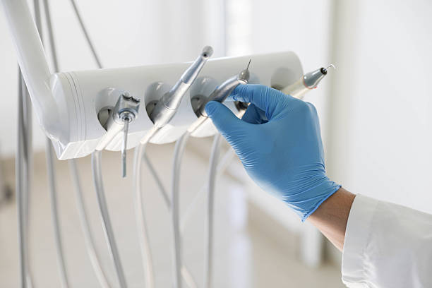 Professional Tooth Extraction technician working in Burlington, VT